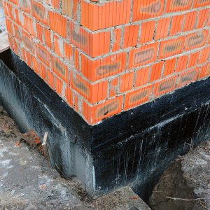 How to waterproof and repair a poorly fixed exterior hole at the foundation  level? : r/HomeMaintenance